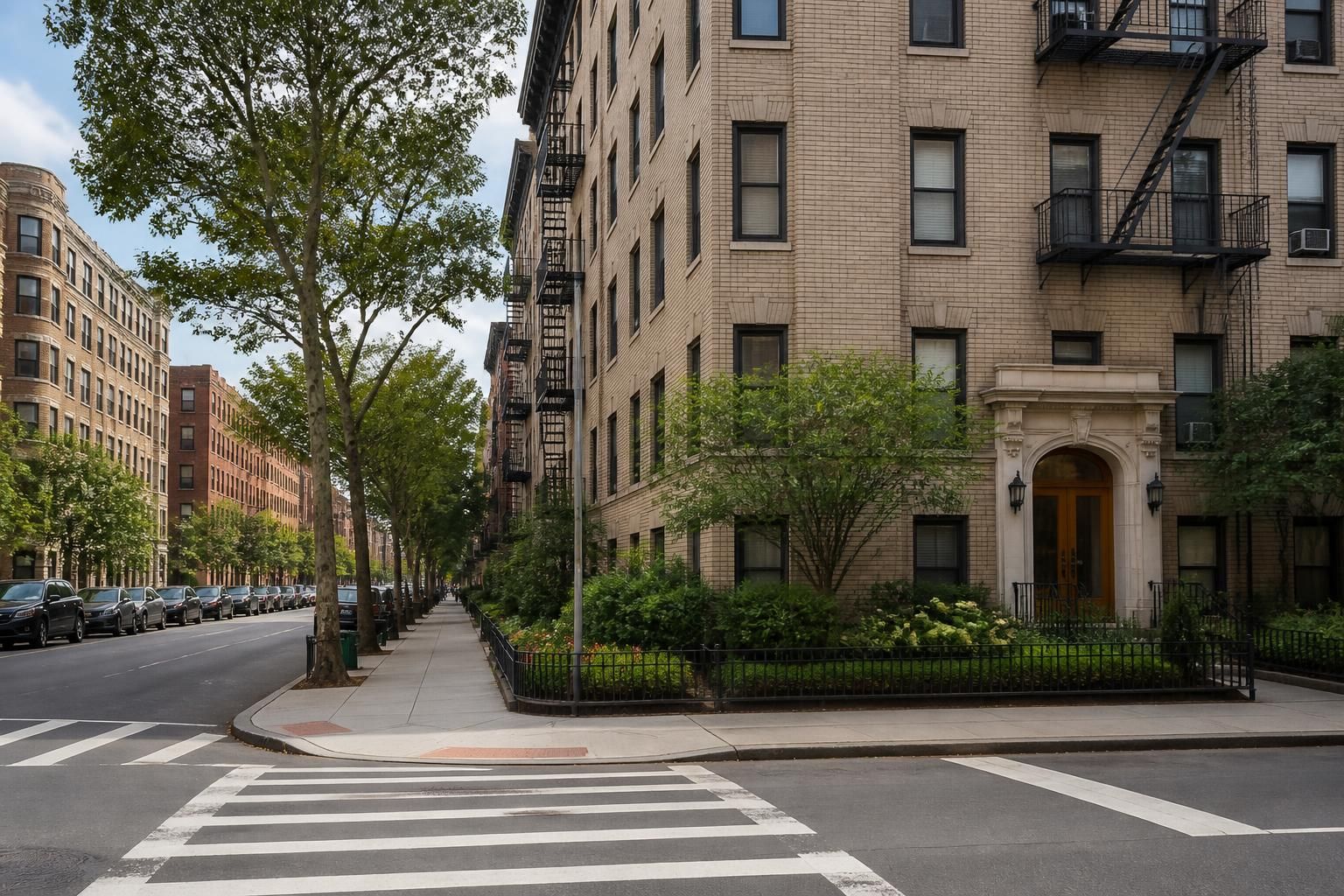 Kingsbridge street with well-kept apartment buildings.
